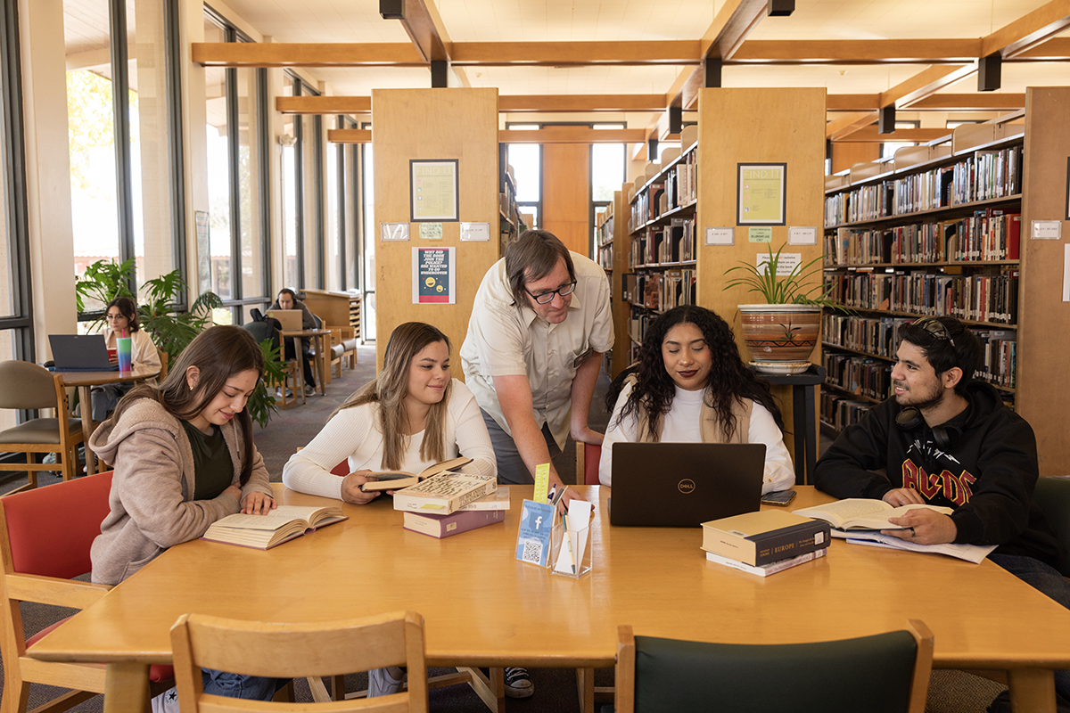 students learning in the library