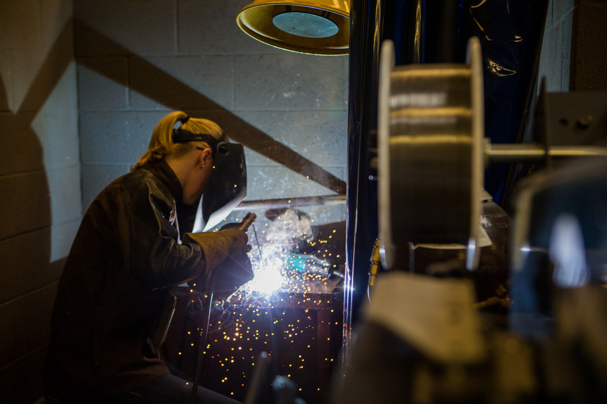 Female in a welding lab