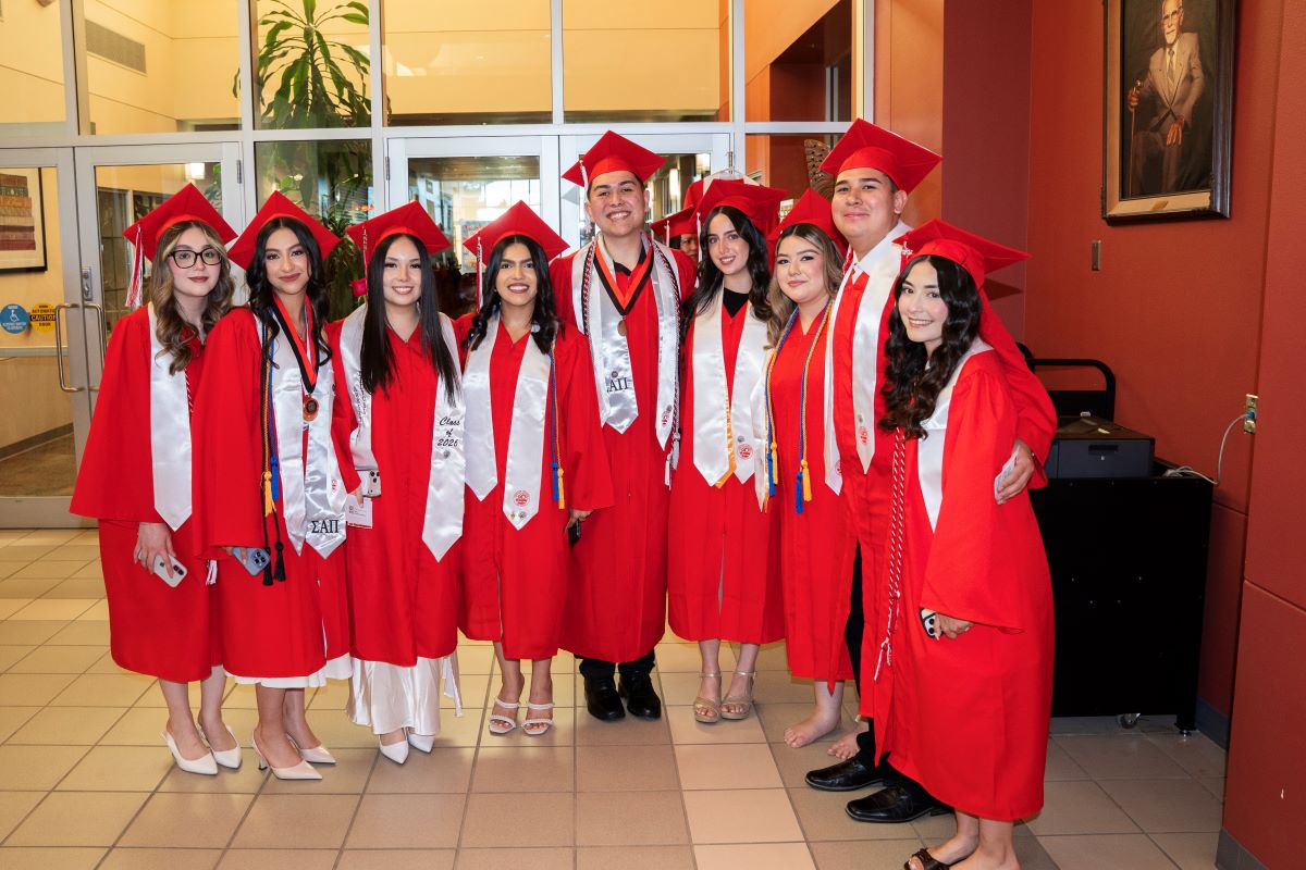 Group of graduates wearing caps and gowns