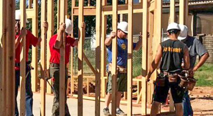 construction students framing a house